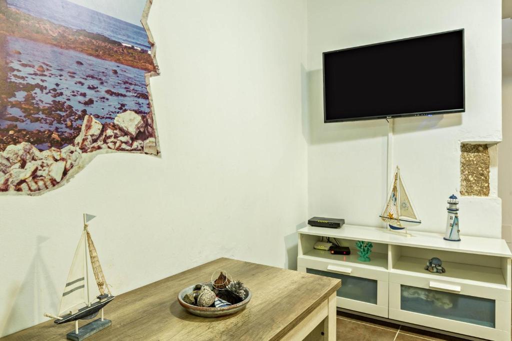 TV a/nebo společenská místnost v ubytování La Ventana de San Cristobal