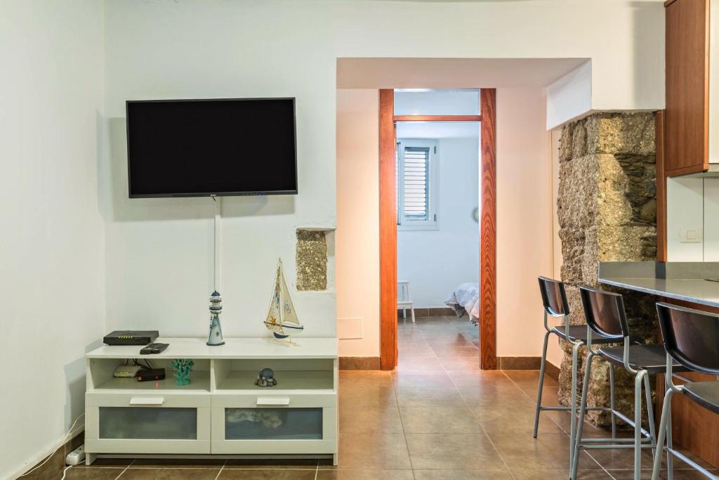 TV a/nebo společenská místnost v ubytování La Ventana de San Cristobal