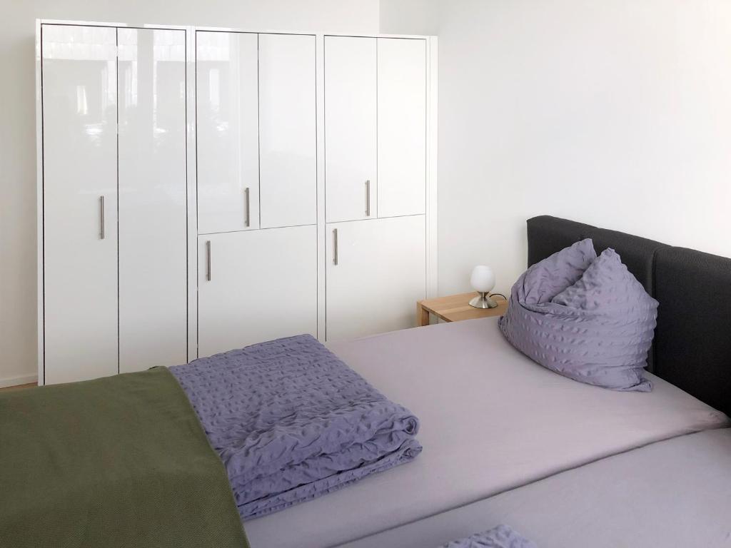 Postel nebo postele na pokoji v ubytování Hotel Profis