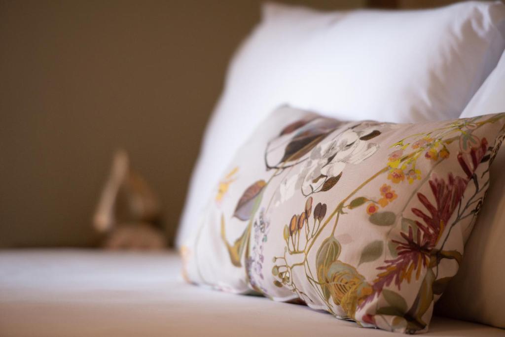 Postel nebo postele na pokoji v ubytování Hotel Olga