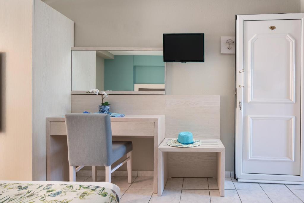 TV a/nebo společenská místnost v ubytování Hotel Olga