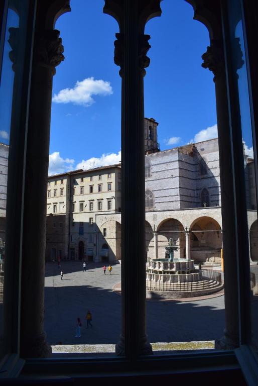 a view of a building from a window at Appartamento Vannucci 10 in Perugia