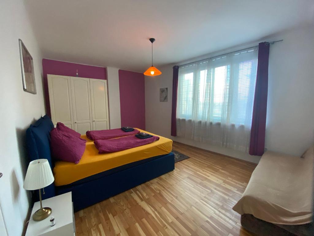 Posteľ alebo postele v izbe v ubytovaní Apartment Domino