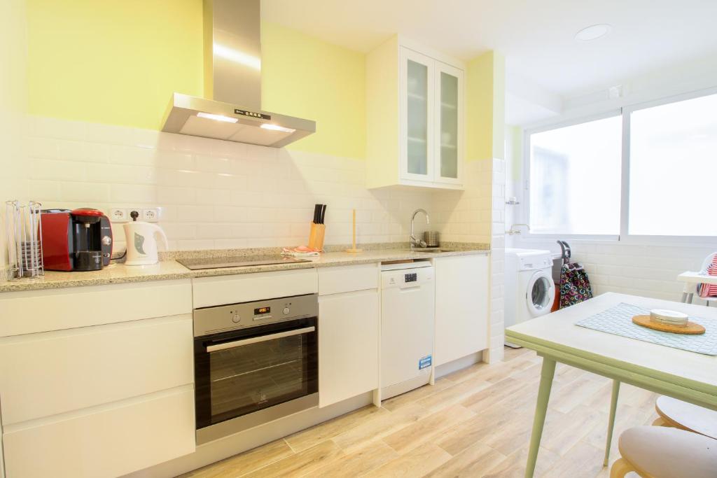 Kuchyň nebo kuchyňský kout v ubytování Bernia Apartment