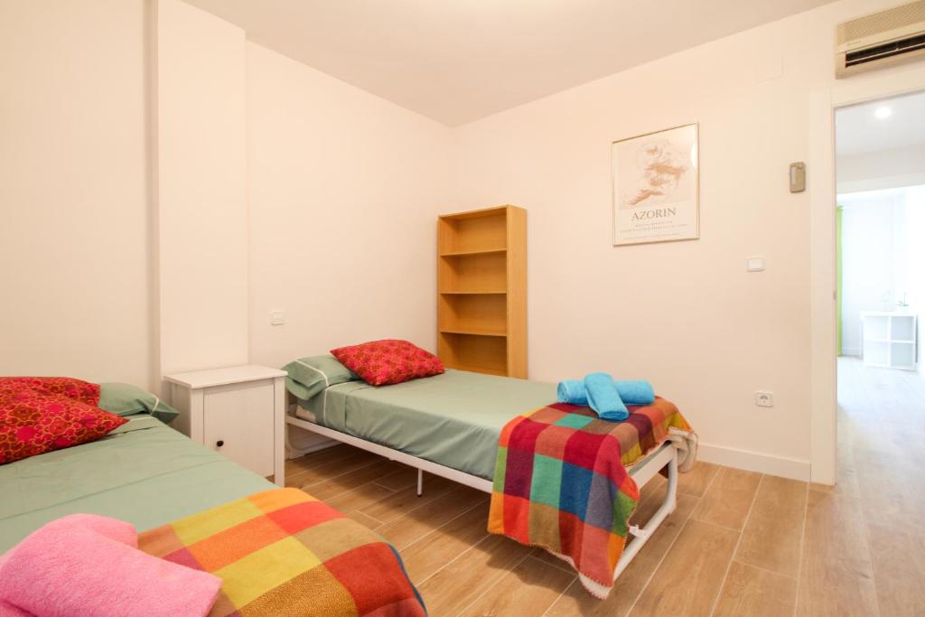 Postel nebo postele na pokoji v ubytování Bernia Apartment