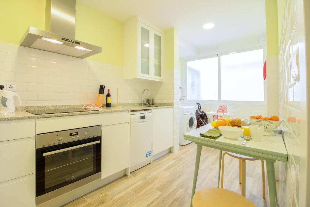 Kuchyň nebo kuchyňský kout v ubytování Bernia Apartment