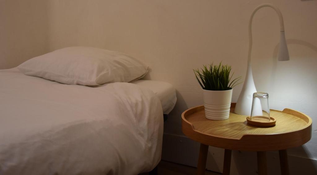 Posteľ alebo postele v izbe v ubytovaní Slow City Hostel Pontevedra