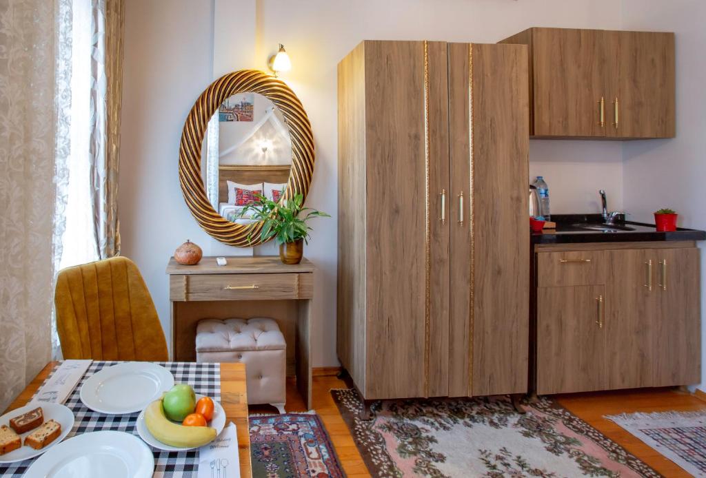 Kuchyň nebo kuchyňský kout v ubytování April Story Apart Hotel