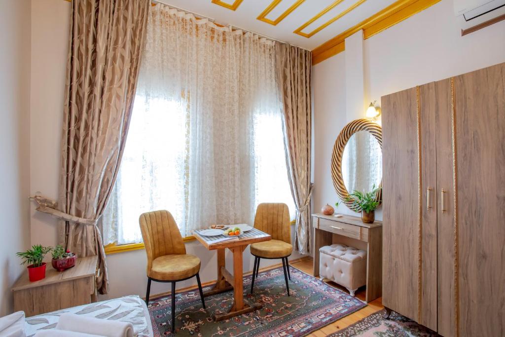 Postel nebo postele na pokoji v ubytování April Story Apart Hotel