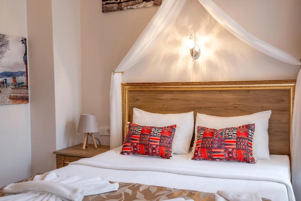 Postel nebo postele na pokoji v ubytování April Story Apart Hotel