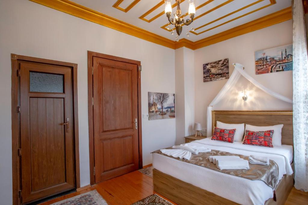 Postel nebo postele na pokoji v ubytování April Story Apart Hotel