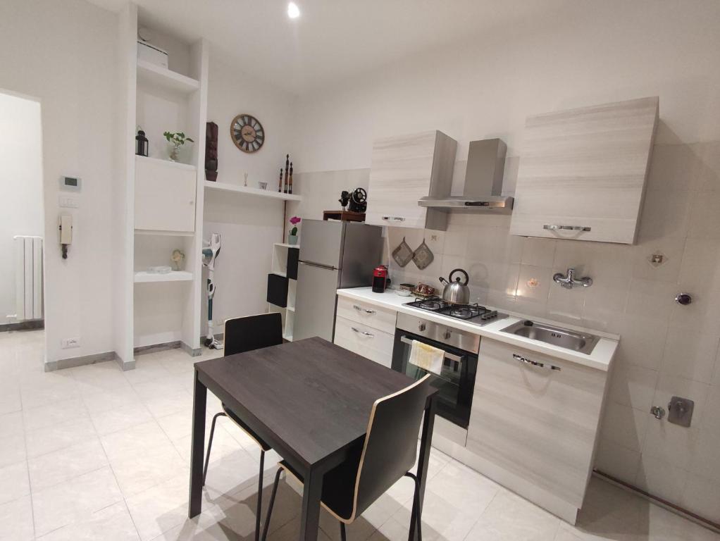 A kitchen or kitchenette at House Passarotti, 21