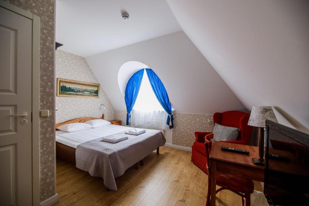 Postel nebo postele na pokoji v ubytování Saka Manor