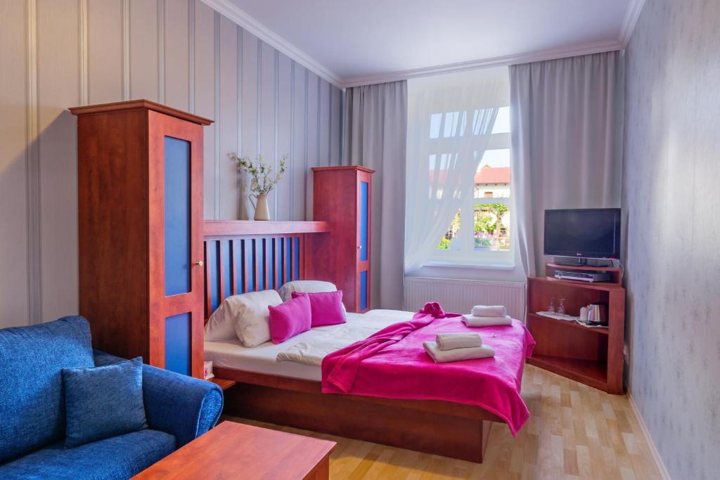Postel nebo postele na pokoji v ubytování Hotel Bonsai