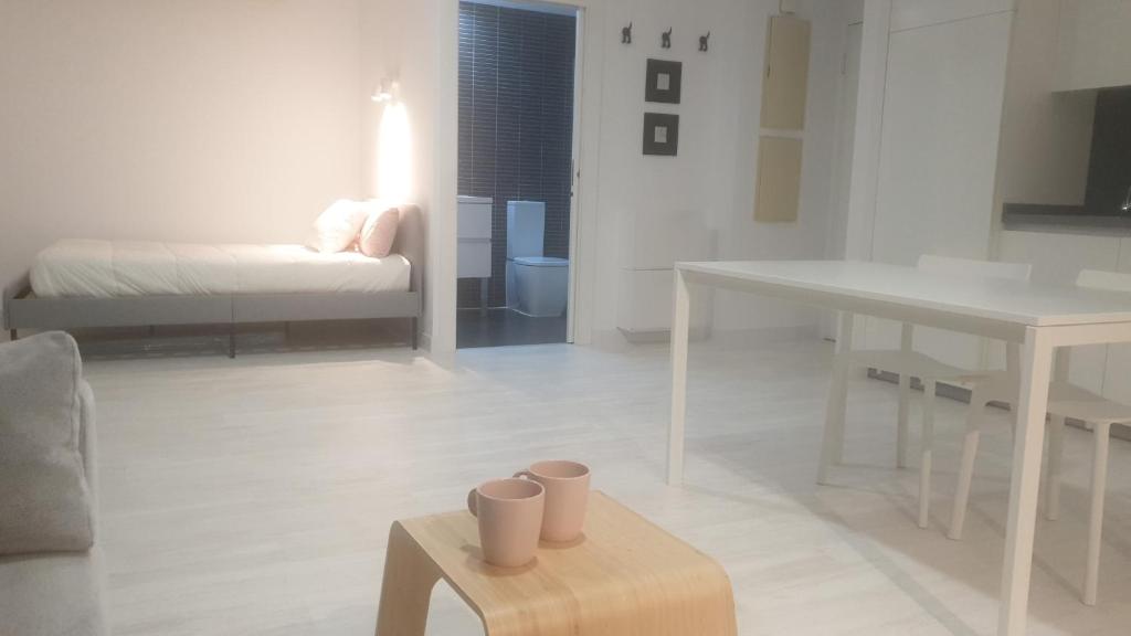 TV a/nebo společenská místnost v ubytování aeropuerto loft polígono