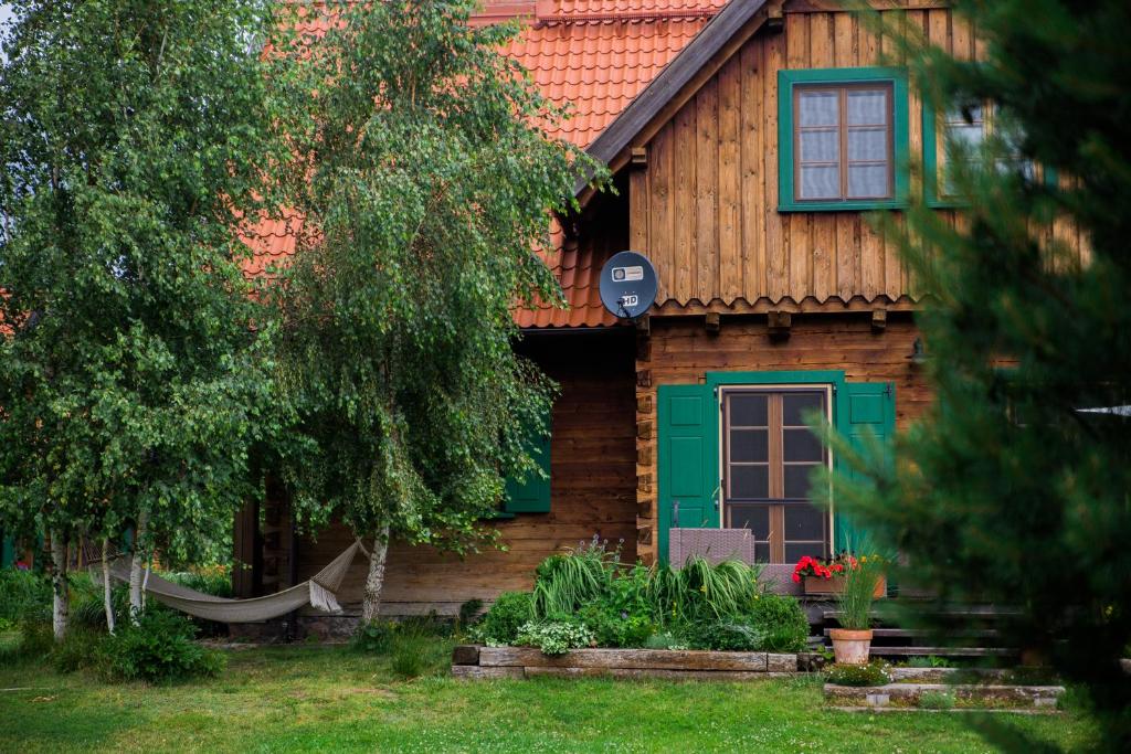 Vonkajšia záhrada v ubytovaní Gosciniec Szuwary