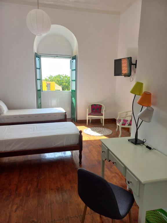 Postel nebo postele na pokoji v ubytování Hotel Savana