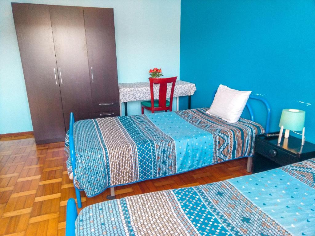 Postel nebo postele na pokoji v ubytování Enjoy Braga Estação - Charming Bedrooms in the Historic Center