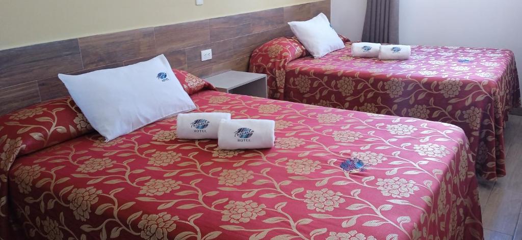 Katil atau katil-katil dalam bilik di Hotel Teresita
