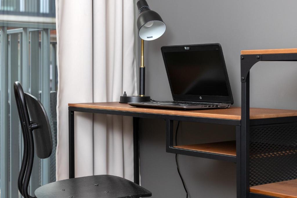 Televízia a/alebo spoločenská miestnosť v ubytovaní Rajska 8 Apartments Old Town Gdańsk by Renters Prestige
