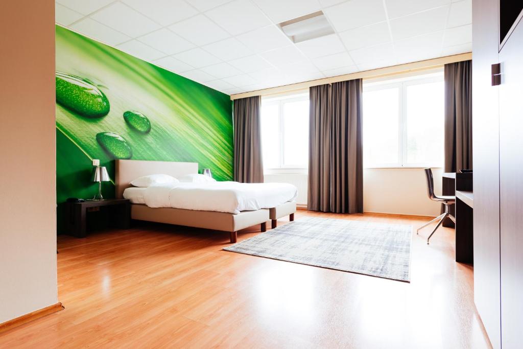 Postel nebo postele na pokoji v ubytování Hotel Soret