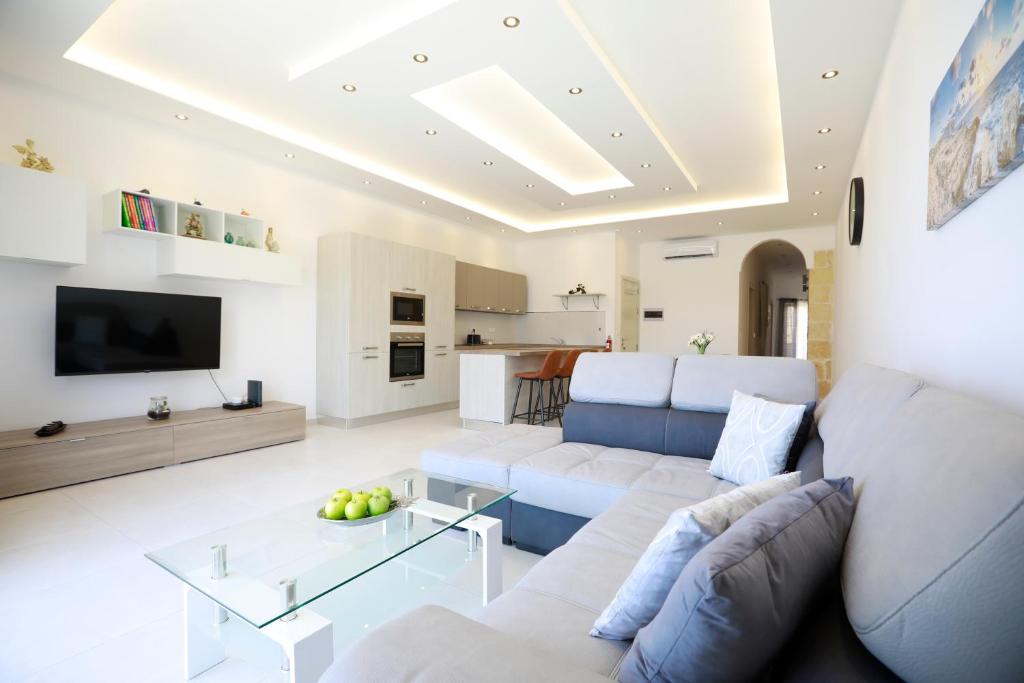 Et opholdsområde på 3-bedroom Apartment with views in Iz-Zebbug, Gozo