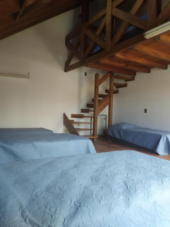 Postel nebo postele na pokoji v ubytování Tanino Guest House