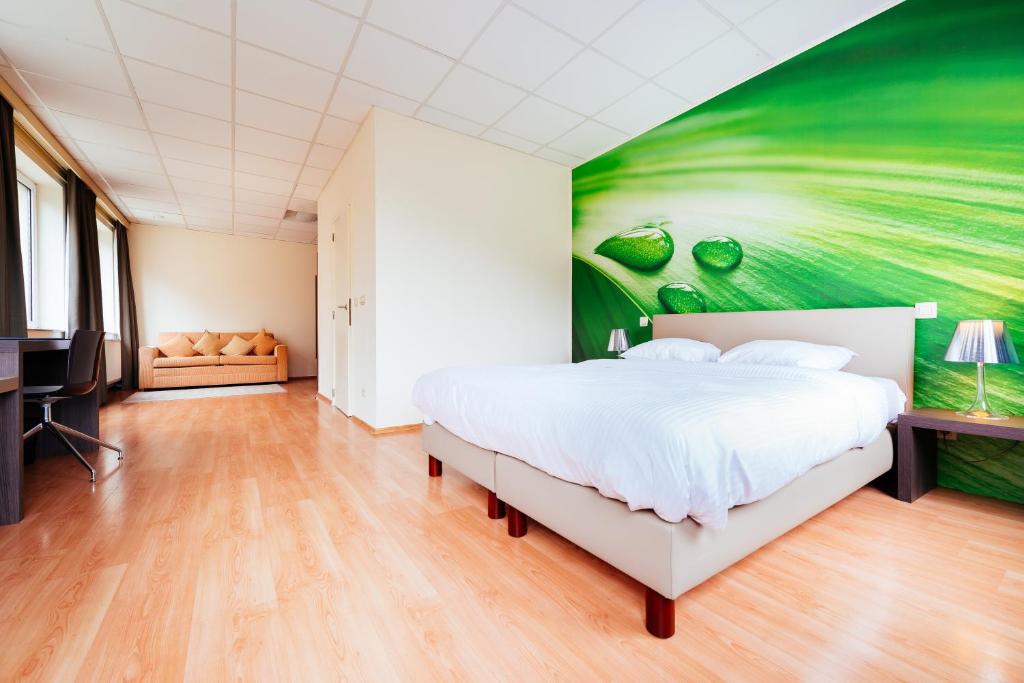 Postel nebo postele na pokoji v ubytování Hotel Soret