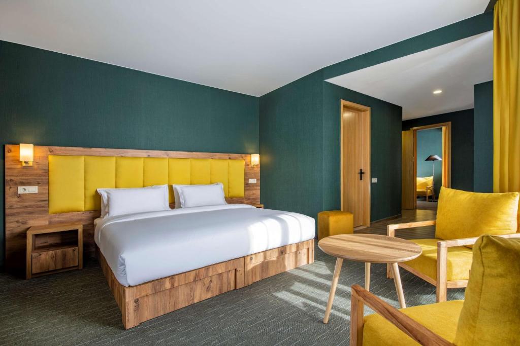 Postel nebo postele na pokoji v ubytování Best Western Gudauri