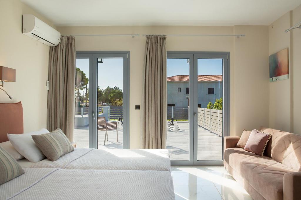 Posteľ alebo postele v izbe v ubytovaní Lighthouse Villas Kefalonia