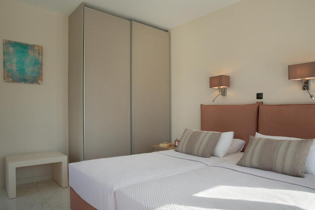 Posteľ alebo postele v izbe v ubytovaní Lighthouse Villas Kefalonia