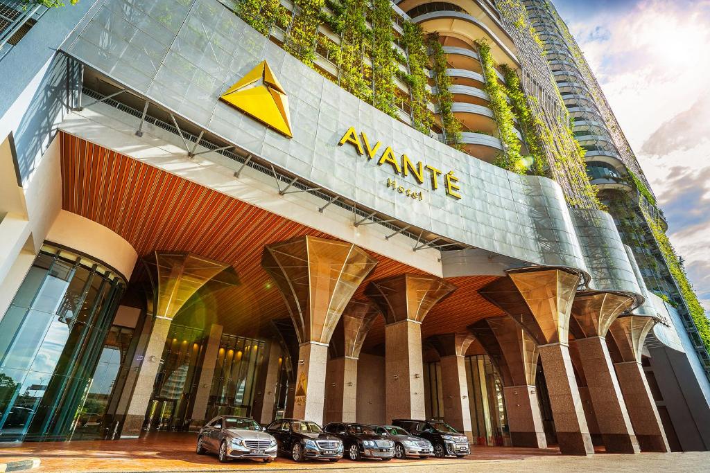 a large building with cars parked in front of it at Avante Hotel in Petaling Jaya