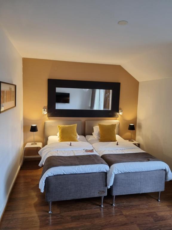 Postel nebo postele na pokoji v ubytování Hotell Västerås