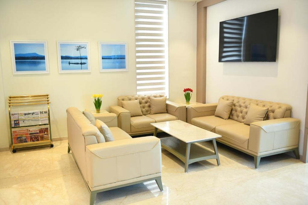 Posezení v ubytování Hotel Blueivy Anand