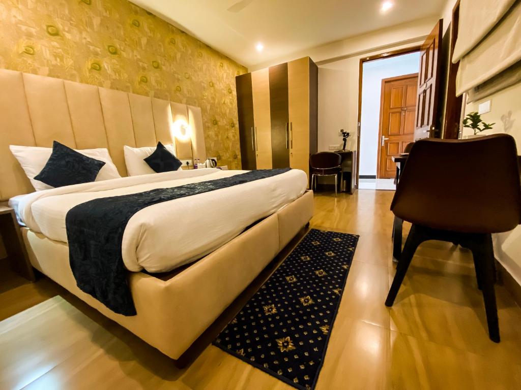 Postel nebo postele na pokoji v ubytování Sky Suites