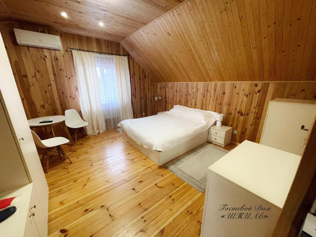 Postel nebo postele na pokoji v ubytování Shtil