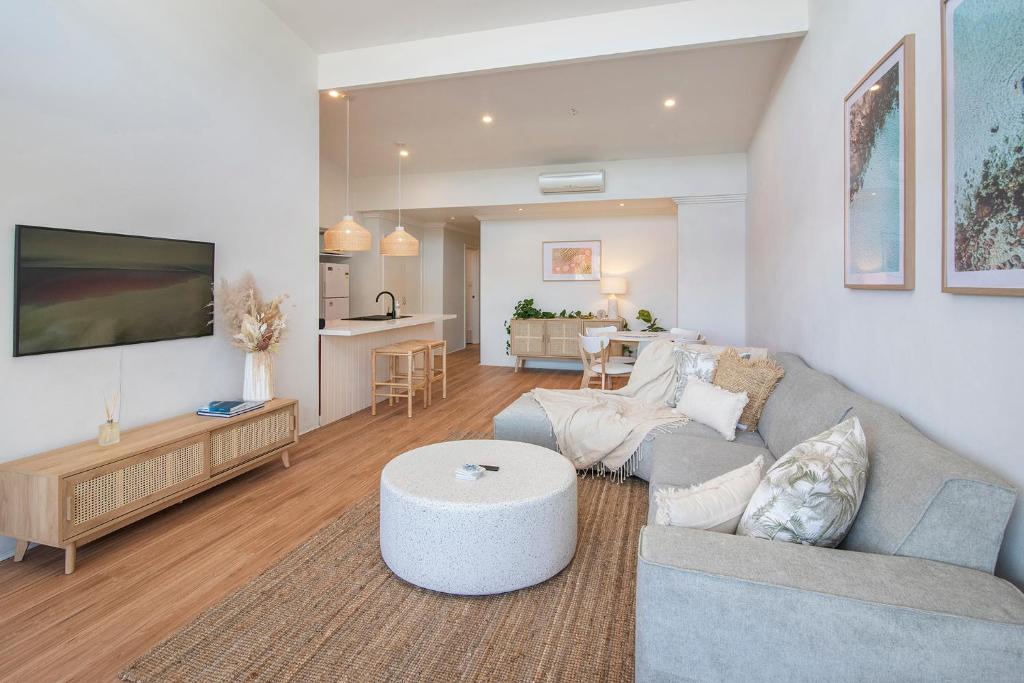 a living room with a couch and a table at Villa on Fearn in Margaret River Town