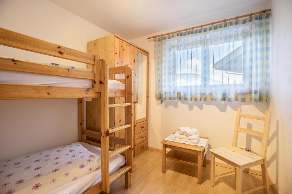 Postel nebo postele na pokoji v ubytování Lettnerhof Bnb Wohnung 4