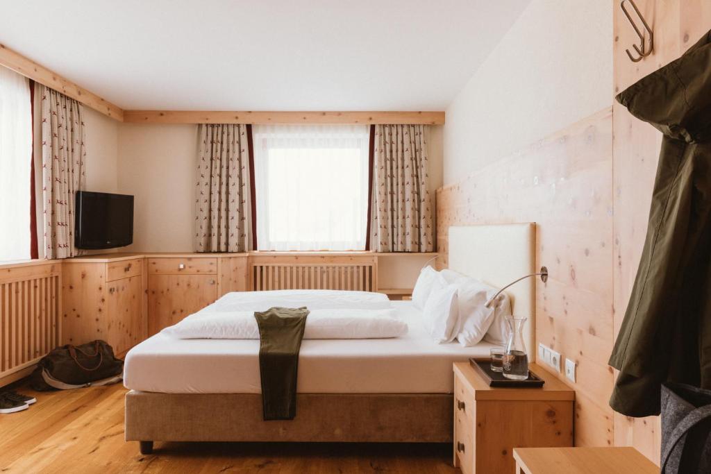 TV a/nebo společenská místnost v ubytování Gartenhotel Linde 4 Sterne Superior