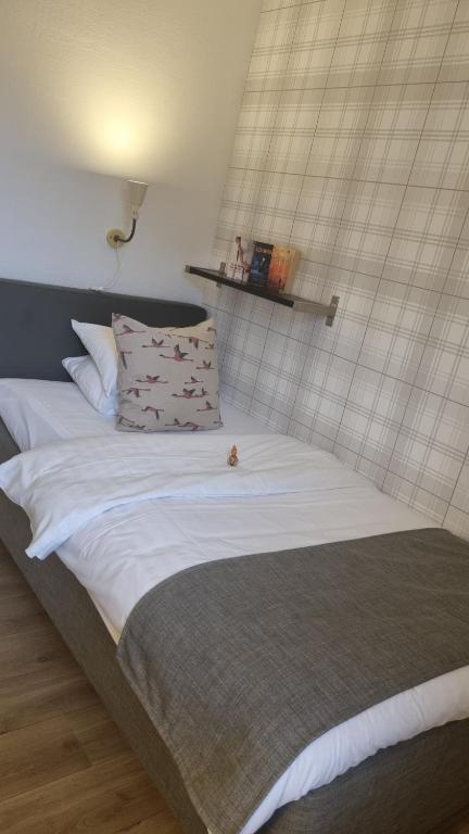 Postel nebo postele na pokoji v ubytování Hotell Västerås