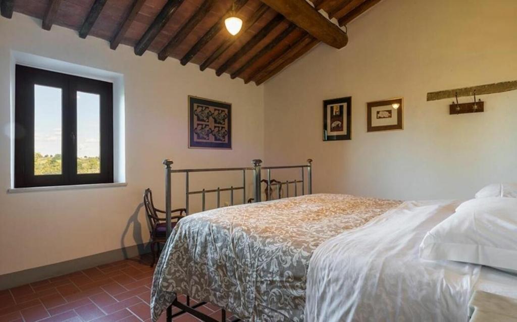 Łóżko lub łóżka w pokoju w obiekcie Villa le Mura