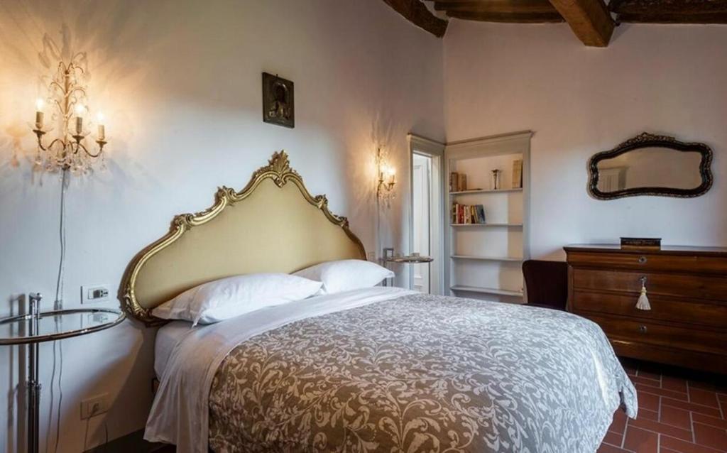 Łóżko lub łóżka w pokoju w obiekcie Villa le Mura