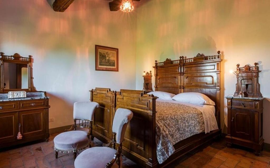 Łóżko lub łóżka w pokoju w obiekcie Villa le Mura
