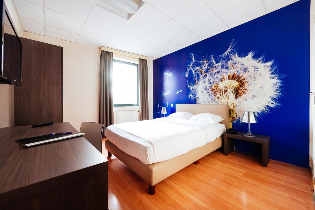 Postel nebo postele na pokoji v ubytování Hotel Soret
