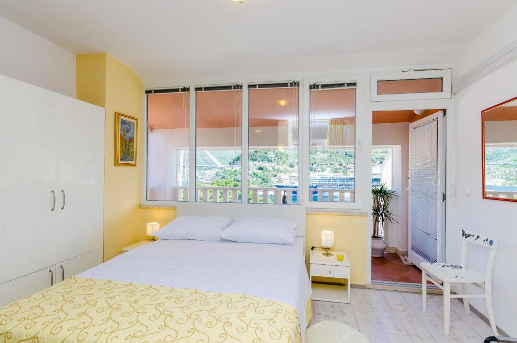 Posteľ alebo postele v izbe v ubytovaní Guest House Avdic