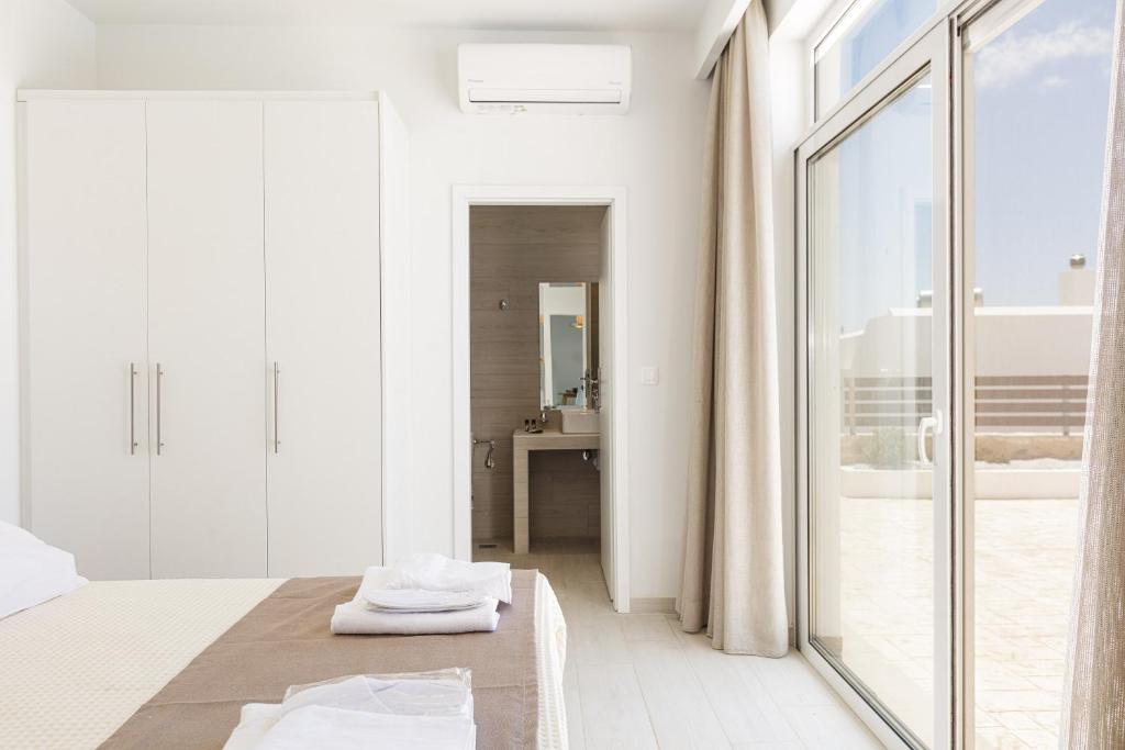 Posteľ alebo postele v izbe v ubytovaní Petres Villas