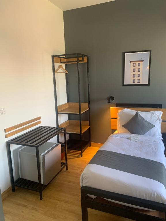 Postel nebo postele na pokoji v ubytování Loft 24, Mansarovar