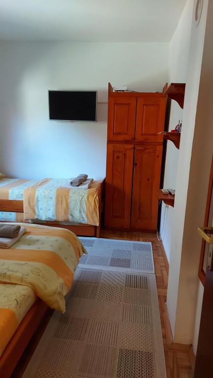 Postel nebo postele na pokoji v ubytování Marko'S Apartments
