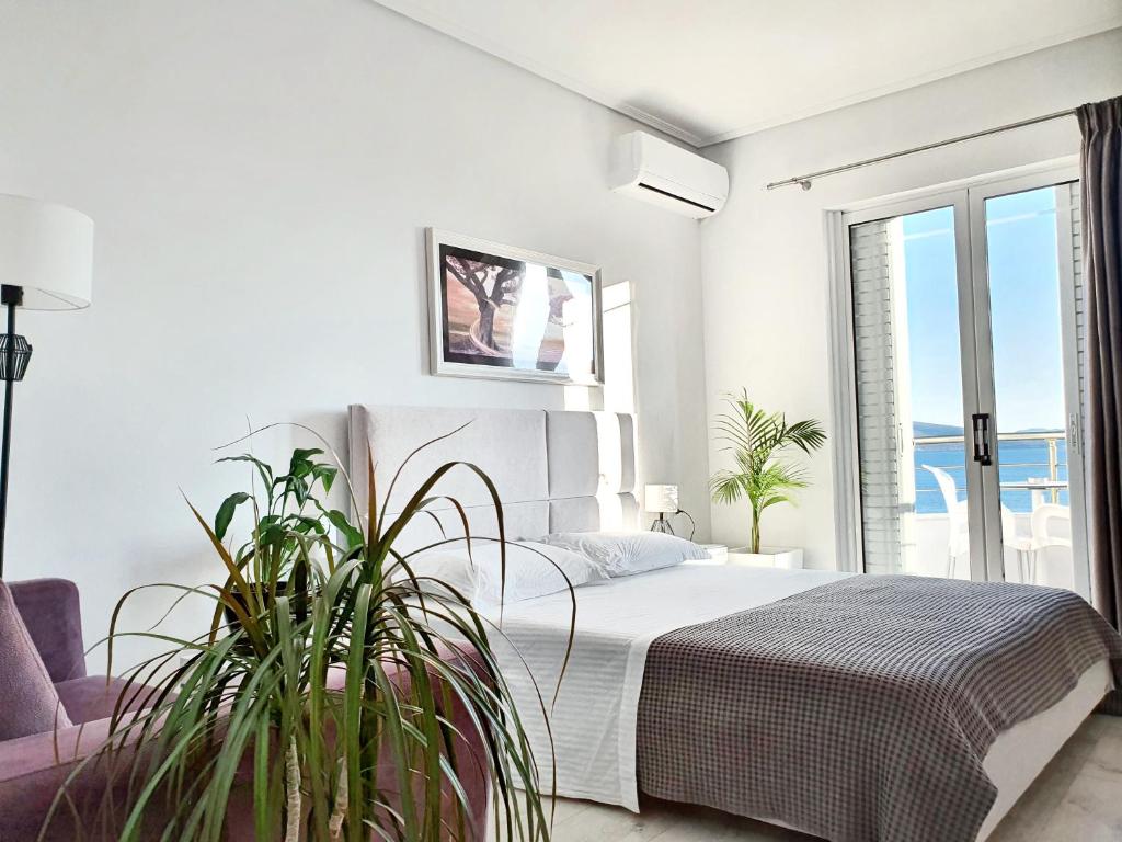 Postel nebo postele na pokoji v ubytování Hotel JoAn