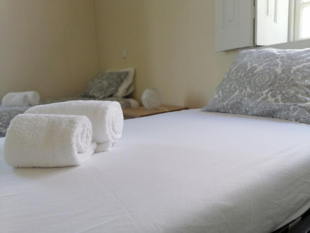 Postel nebo postele na pokoji v ubytování Camelia Rooms